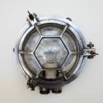 Old Wall Lamp in Cast Aluminum with Hexagonal Grid. anciellitude