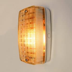 Old wall lamp in cast aluminum and grid glass anciellitude